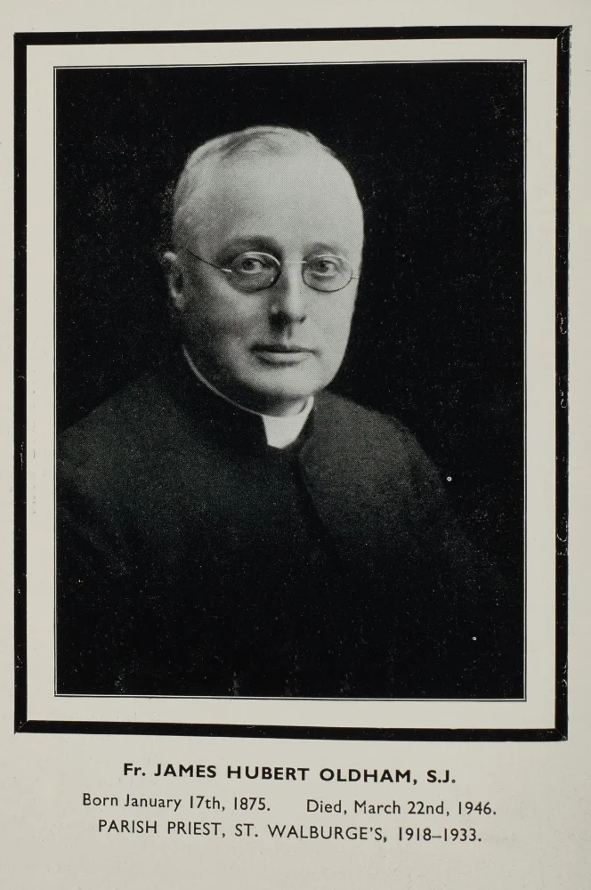 Portrait photograph of Fr. James Hubert Oldham S.J., wearing glasses and clerical collar. Born 1875, died 1946; Parish Priest, St Walburge's, 1918–1933.