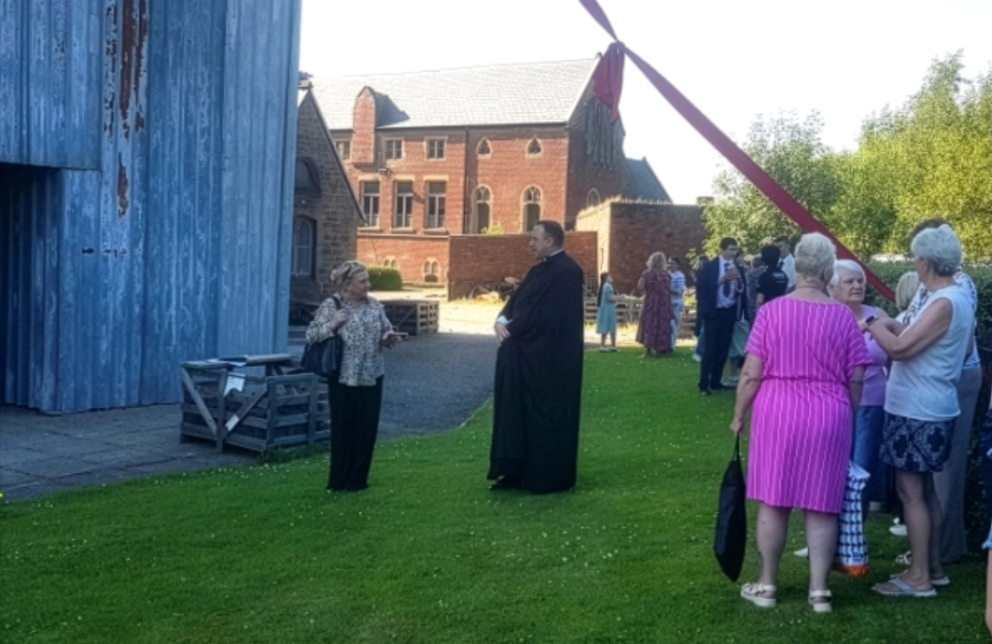 Guests gathered on the lawn outside St Walburge's, as part of the Exhibition launch event.